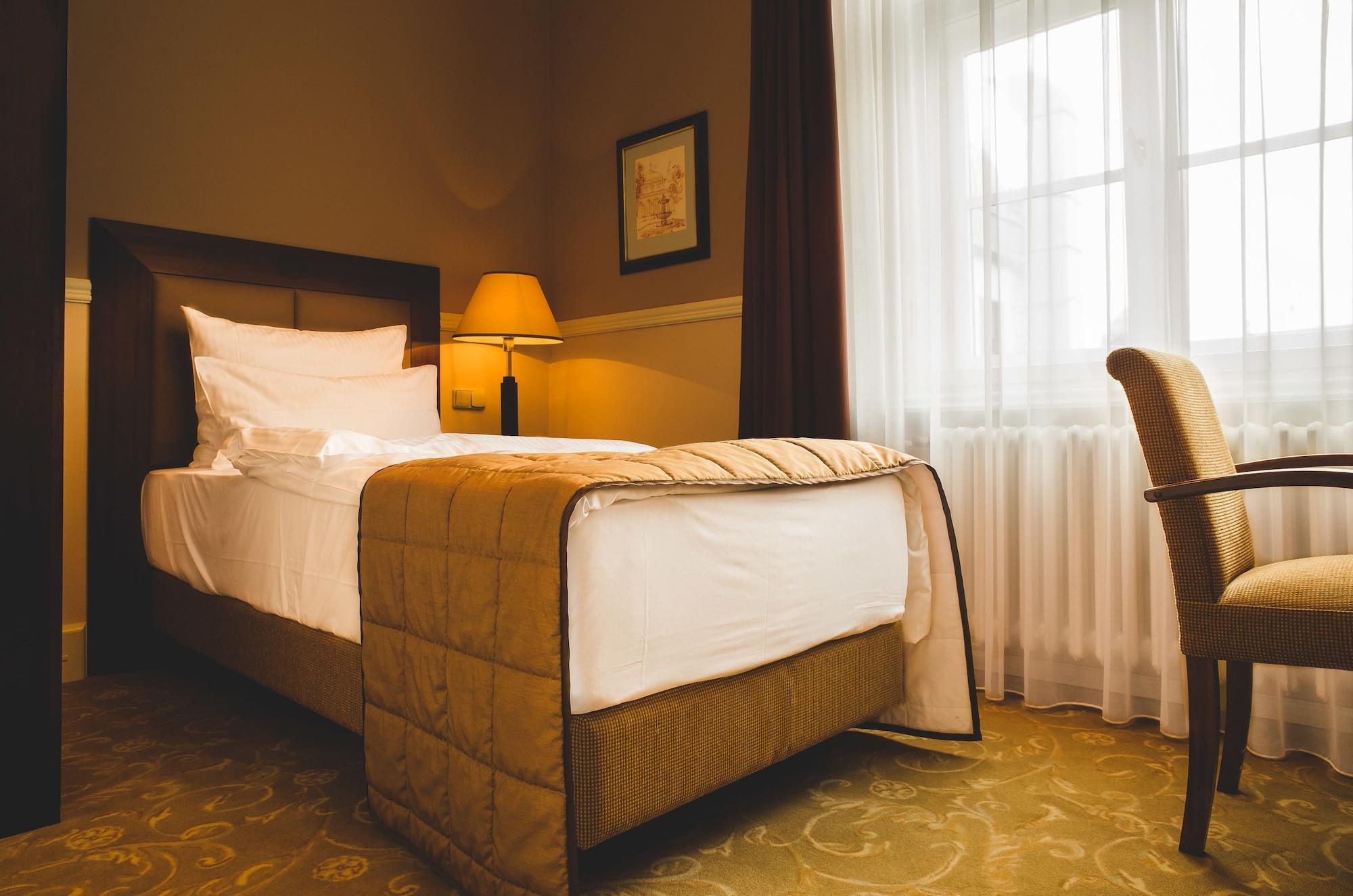 Esplanade Hotel פראג מראה חיצוני תמונה A bedroom